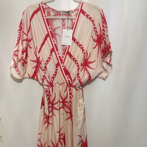 Jaki Dresses & Skirts - Jaki Cream Maxi Dress with Red Tropical Print